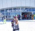 KAPRUN, AUSTRIA, March 12, 2019: Skiers are getting out from Gletscherjet 4 Cable car ski lift on the top of the glacier