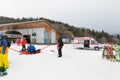 The ambulance staff provided first aid to the injured skier at a Royalty Free Stock Photo