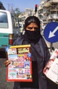 Female sells weekly magazine in Karachi Pakistan