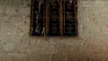 Karachi, Pakistan. A house where slaves or hostages are held captive in Pakistan. Window with lattices. Illegal slave