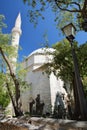 Karadoz Bey Mosque, located on Brace Fejica street, with a street lamp in the foreground Royalty Free Stock Photo