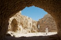Tourist visits medieval crusaders castle in Al Karak, Jordan.