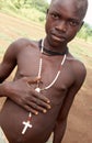 A Karamojong boy wearing a cross.