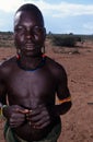 A Karamojong man with scarified skin, Uganda