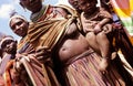 A Karamojong woman showing her scarified skin, Uganda