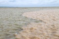 The encounter of two water masses with different characters in front of the Karangantu Port entrance, Banten Bay. Royalty Free Stock Photo