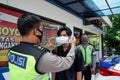 KARANGANYAR, INDONESIA - NOVEMBER 10 2020: The Indonesian traffic police carry out disciplinary operations on the COVID-19