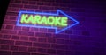 Karaoke neon sign glowing above bar or open mic establishment - 4k