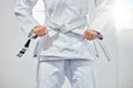 karate belt, martial arts and woman ready for fight battle, white dojo training or fitness challenge workout. Warrior Royalty Free Stock Photo