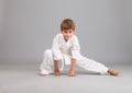 Karate boy in white kimono fighting Royalty Free Stock Photo