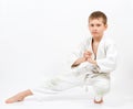 Karate boy in white kimono fighting Royalty Free Stock Photo