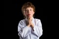 Karate boy in white kimono isolated on black Royalty Free Stock Photo