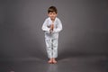 Karate boy in white kimono