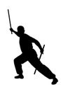Karate fighter with sticks Royalty Free Stock Photo