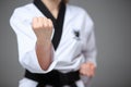 The karate girl with black belt Royalty Free Stock Photo