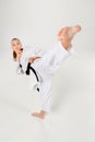 The karate girl with black belt Royalty Free Stock Photo