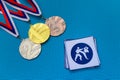 Karate Kumite icon and medal set, gold silver and bronze medal, blue background. Original wallpaper for summer olympic game in
