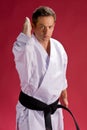 Karate man in black belt Royalty Free Stock Photo