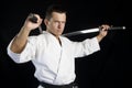 Karate man with katanas Royalty Free Stock Photo