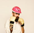 Karate man with serious face in golden boxing gloves Royalty Free Stock Photo