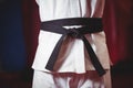 Karate player in black belt Royalty Free Stock Photo