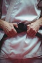 Karate player in black belt Royalty Free Stock Photo