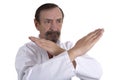 Karate position demontrated by a senior man Royalty Free Stock Photo