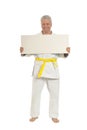 Karate Senior man with poster Royalty Free Stock Photo