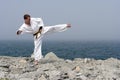 Karate on the shores of the sea Royalty Free Stock Photo
