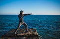Karate training on the shores of the sea Royalty Free Stock Photo