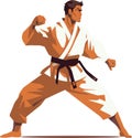 A karateka in dynamic fighting stance Royalty Free Stock Photo