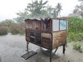 Karawang, Indonesia, 5 October 2022: the chicken coop exposed to the rain, the wind stays strong