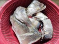 Karawang, Indonesia, 16 September 2022: Fresh milkfish has been cleaned and cut ready to be cooked