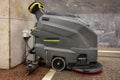 Karcher Professional floor cleaning machine on the charger in Novogireevo underground station. Royalty Free Stock Photo