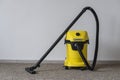 Karcher WD 3 V wet and dry vacuum cleaner. Yellow Karcher vacuum cleaner, close up