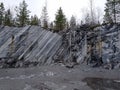 Karelia, ruskeala, Italian quarry, stone mining, stone wall, cliff, landscape, gray stones, rocks, granite, gray marble, quarry Royalty Free Stock Photo