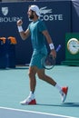 Karen Khachanov of Russia in action during quarter-final match against Francisco Cerundolo of Argentina at 2023 Miami Open