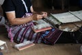 Karen woman pulling and taking out wool . Royalty Free Stock Photo