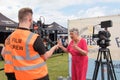 Karen Wright celebrity baker being interviewed by a film crew at Seaham Food Festival Royalty Free Stock Photo