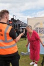 Karen Wright celebrity baker being interviewed by a film crew at Seaham Food Festival Royalty Free Stock Photo