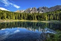 Karersee Lago di Carezza, is a lake in the Dolomites in South Tyrol, Italy.In the background the mountain range of the Latemar g