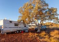 KARIJINI, AUSTRALIA - JUN 6 2013: Grey Nomads Retired Senior Australians camp in bush setting in the Karijini National Park in Royalty Free Stock Photo