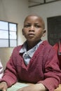 Karimba School with close up of young student in new classroom in North Kenya, Africa