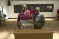 Karimba School with school children in classroom showing textbook in North Kenya, Africa