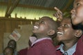 Karimba School with school children smiling in classroom in North Kenya, Africa