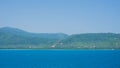 A karimun jawa big island with mountain view from ship with blue sea and sky Royalty Free Stock Photo