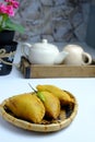 Karipap or curry puff is a one of popular dish on white table Royalty Free Stock Photo