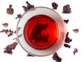 Karkade. Tea drink in a glass. Red liquid in a glass