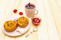 Karkade tea from hibiscus petals Sudanese rose. Gentle romantic breakfast concept. Buns, meringues, strawberry jelly. On a