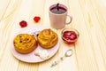 Karkade tea from hibiscus petals Sudanese rose. Gentle romantic breakfast concept. Buns, meringues, strawberry jelly. On a